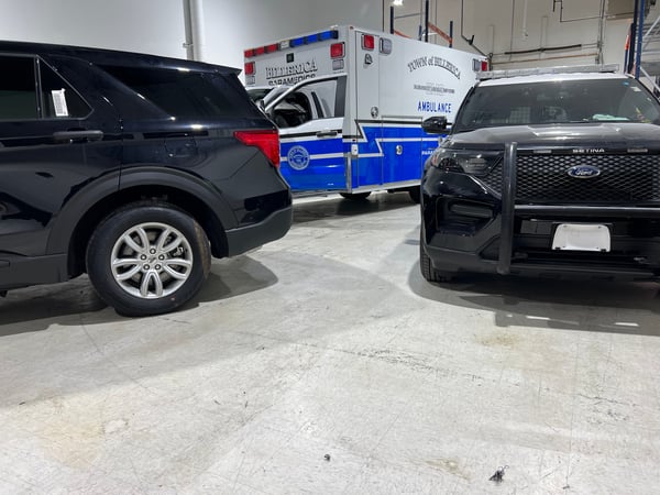 two black police SUVs