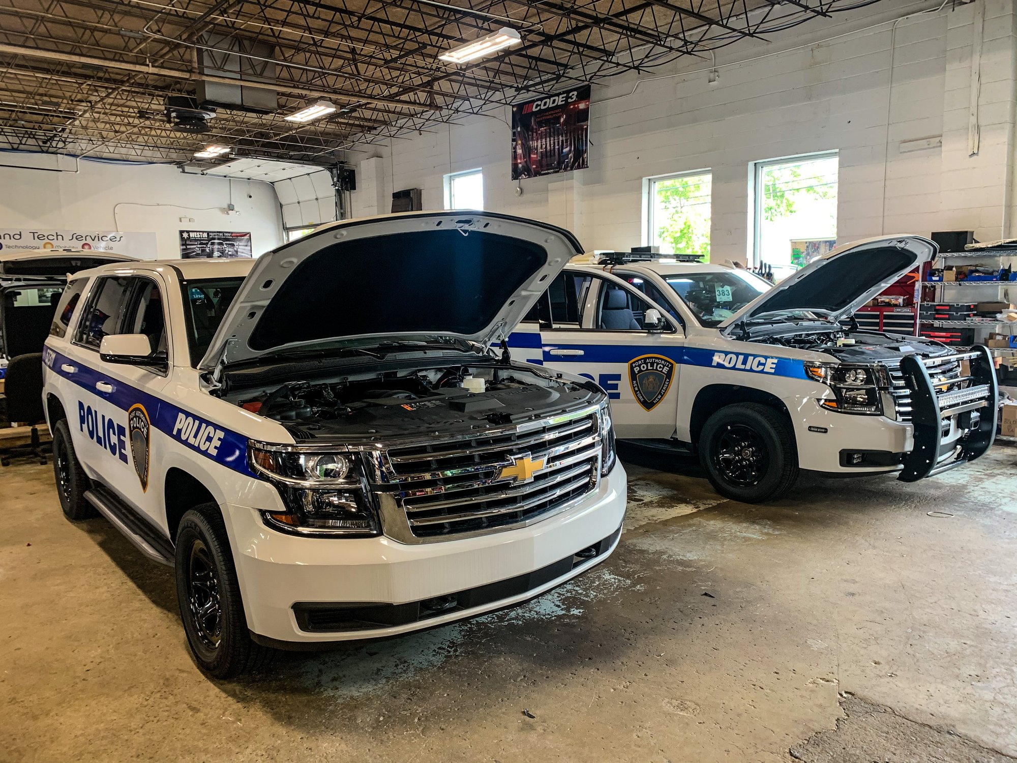 police vehicles in auto shop