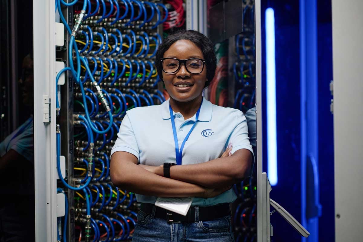 IT professional in front of server rack